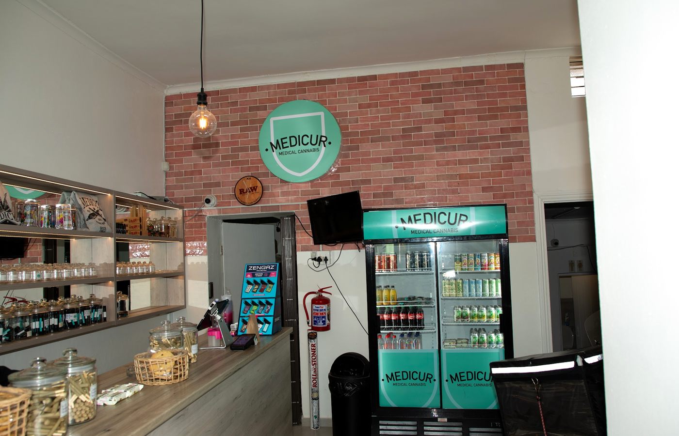 Inside Medicur Observatory: counter, shelves and drinks fridge